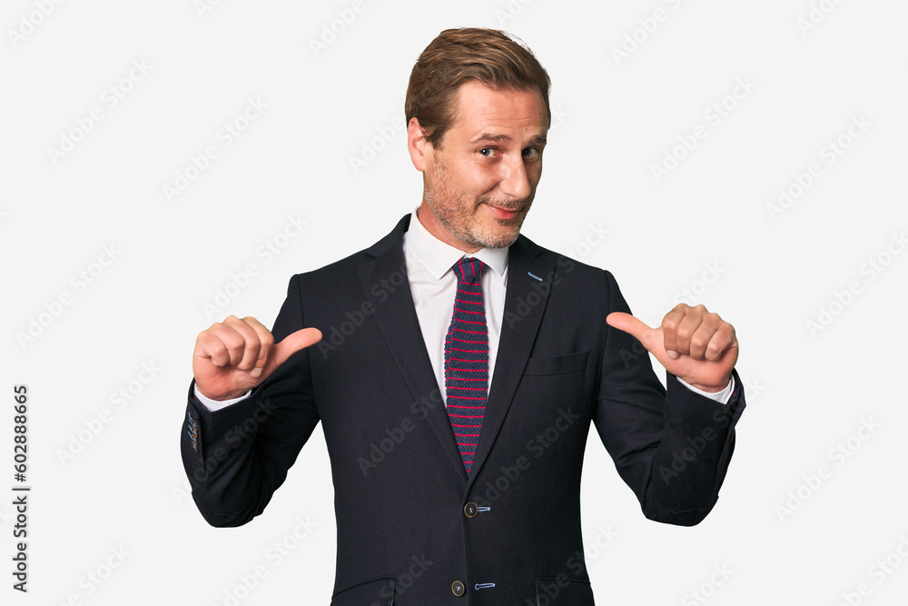 A middle-aged businessman isolated feels proud and self confident, example to follow. A middle-aged businessman isolated feels proud and self confident, example to follow.