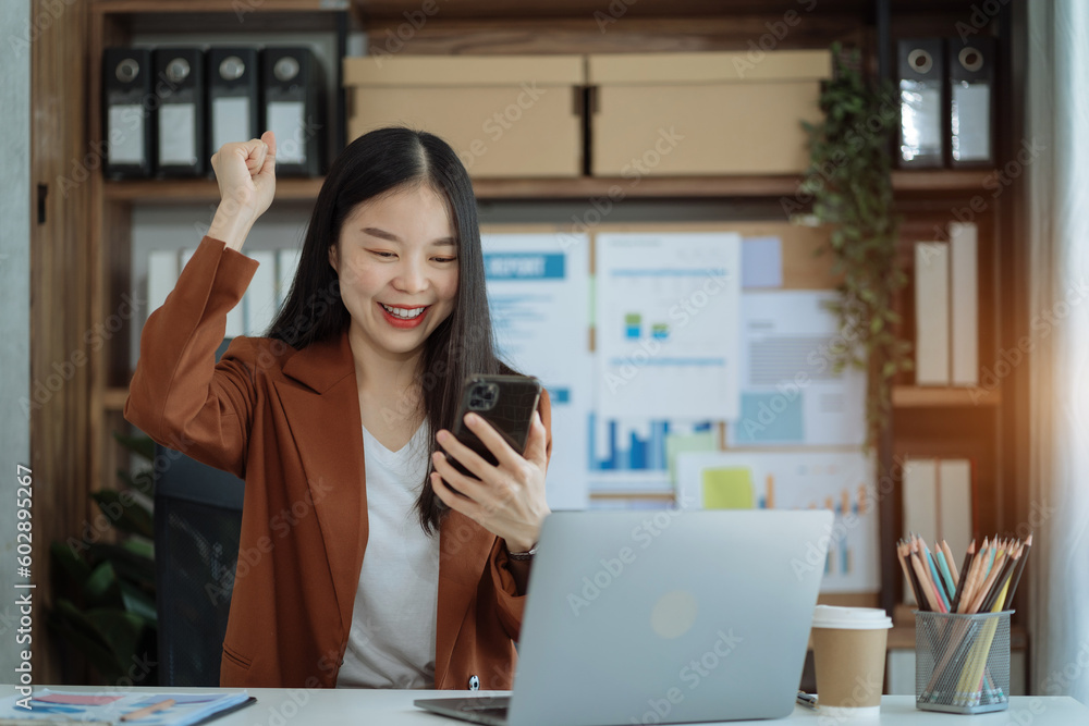 Smiling happy businesswoman feel work complete, success at work in the office concept. Smiling happy businesswoman feel work complete, success at work in the office concept.
