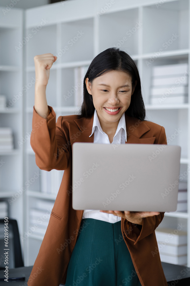 Smiling happy businesswoman feel work complete, success at work in the office concept. Smiling happy businesswoman feel work complete, success at work in the office concept.