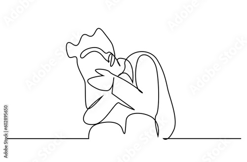 young man  ashamed he puts his hand to his face hiding