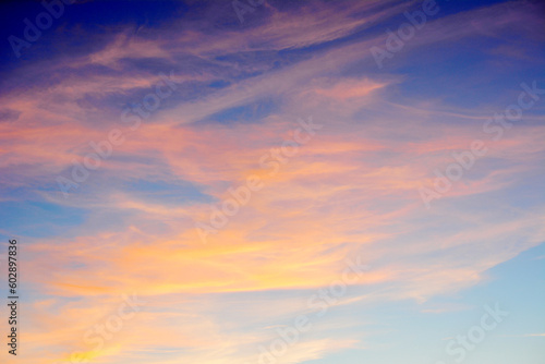 Fototapeta Naklejka Na Ścianę i Meble -  A pink sky in the evening with yellow and pink clouds  