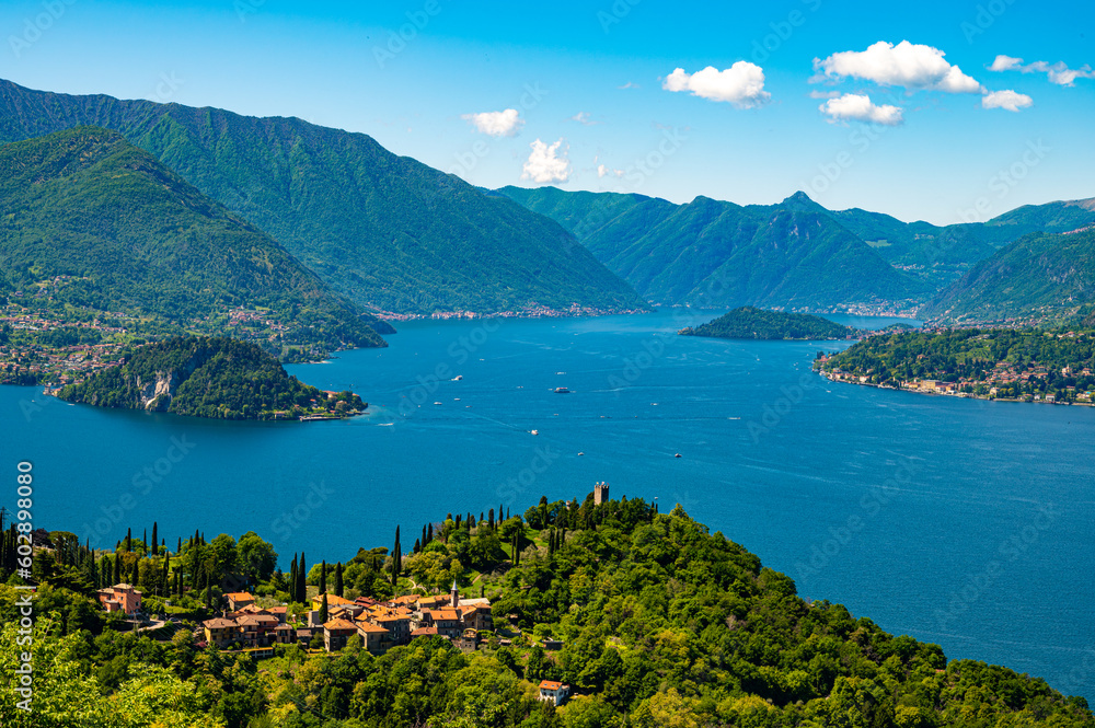 Lake Como, Photographed by Perledo, showing Varenna, Bellagio, Castello di Vezio, and Punta Balbianello, on a spring day.
