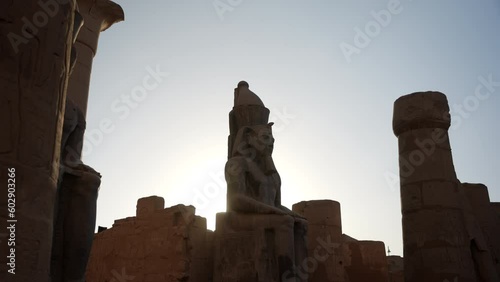 Wallpaper Mural Egyptian statue in the temple in a beautiful sunset, Egypt Torontodigital.ca