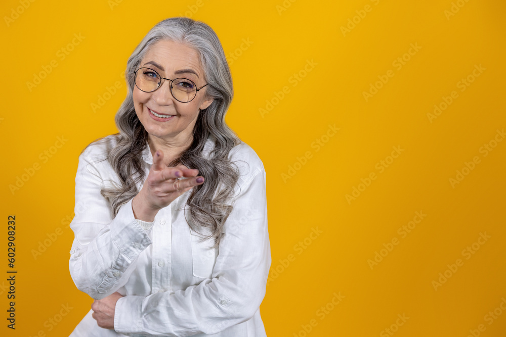 Gray-haired beautiful woman in eyeglasses