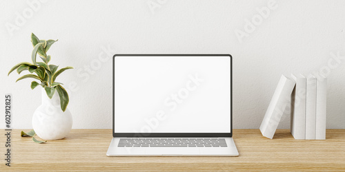 Wallpaper Mural Laptop in a minimalist and modern desk with plants. 3d render Torontodigital.ca