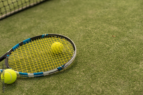 Tennis racket and balls, flat lay. Space for text