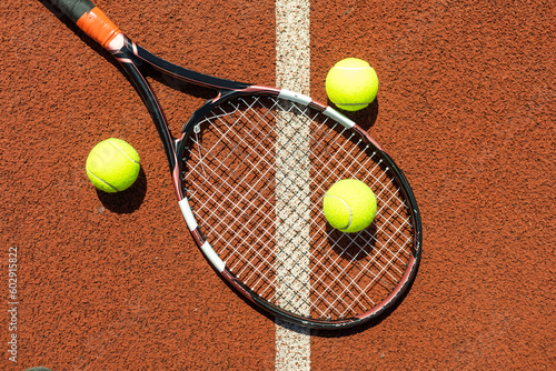 Tennis racket and balls, flat lay. Space for text © Angelov