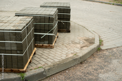 three pallets with paving stones to make the road