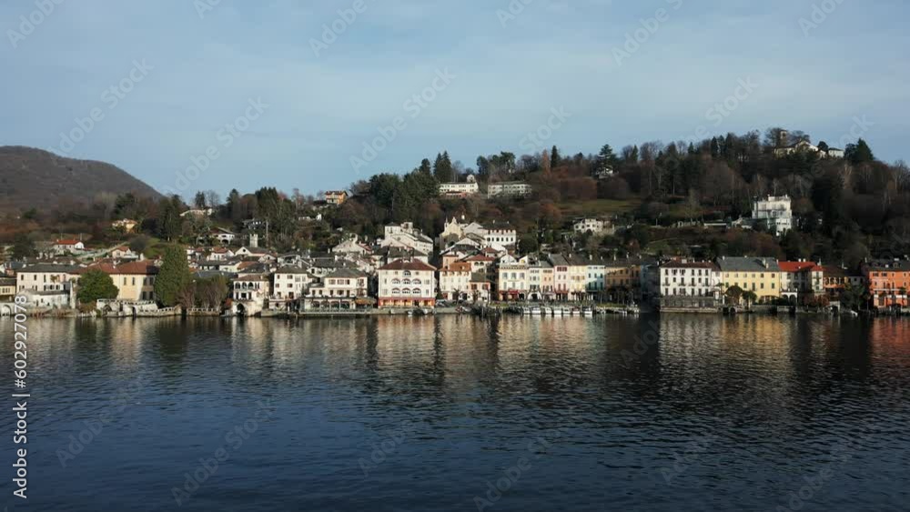 Flying close to Orta San Giulio town by Lake Orta of Italy. Aerial view and sky for copy space Flying close to Orta San Giulio town by Lake Orta of Italy. Aerial view and sky for copy space