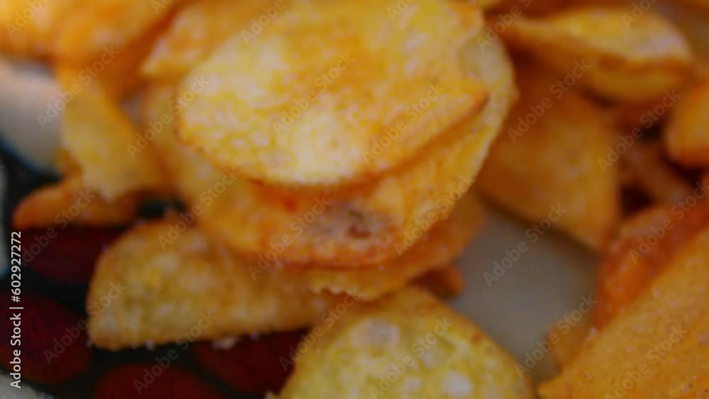 Close-up shot of a bowl of chips. Close-up shot of a bowl of chips.