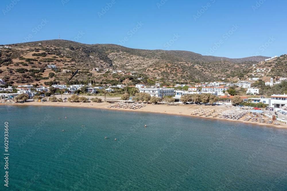 Andros island Batsi village Cyclades Greece. Aerial drone view of sandy beach, sea water blue sky.