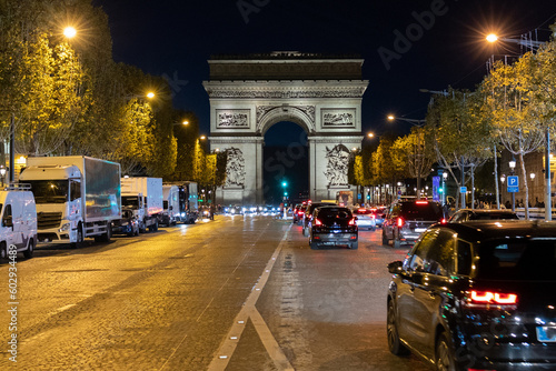 Pedestrian view on traffic road of Champs-Elysess to Arc de Triomphe. © MagioreStockStudio