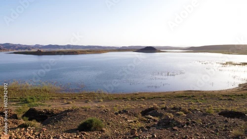 Wallpaper Mural Lake El Mansour Eddahbi dam water reservoir in Ouarzazate, Morocco. Low-level water, drought, volcanic mountains, global warming, 4k footage.  Torontodigital.ca