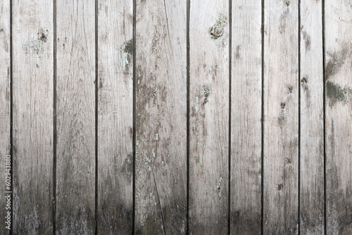 Old wooden background with peeling cracked paint