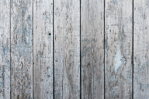 Old wooden background with traces of peeling paint