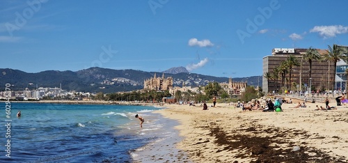 The beach in Palma de Mallorca is a sun-soaked paradise, where golden sands stretch along the crystal-clear waters of the Mediterranean Sea. This idyllic coastal escape is characterized by its invitin © Michaela Holubová