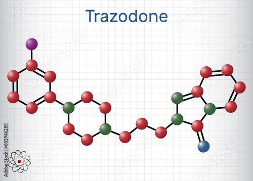 Trazodone molecule. It is antidepressant, used to treat major depressive disorder. Structural chemical formula, molecule model. Sheet of paper in a cage.