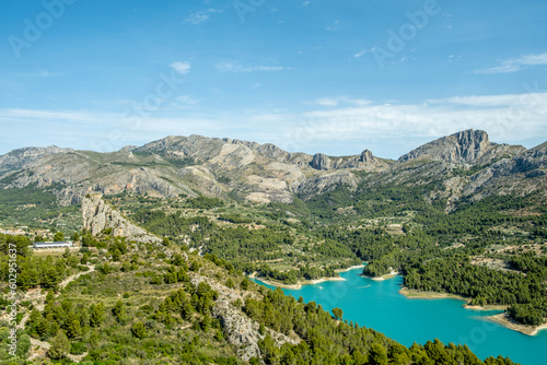 Fototapeta Naklejka Na Ścianę i Meble -  Panoramic view of Guadalest reservoir and Sierra de Serrella mountains. Guadalest is one of most beautiful village of Spain in Alicante province, Valencian Community
