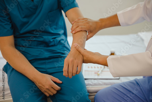 Physiotherapist working with patient in clinic  close-up