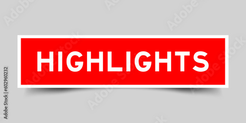 Red color square shape sticker label with word highlights on gray background