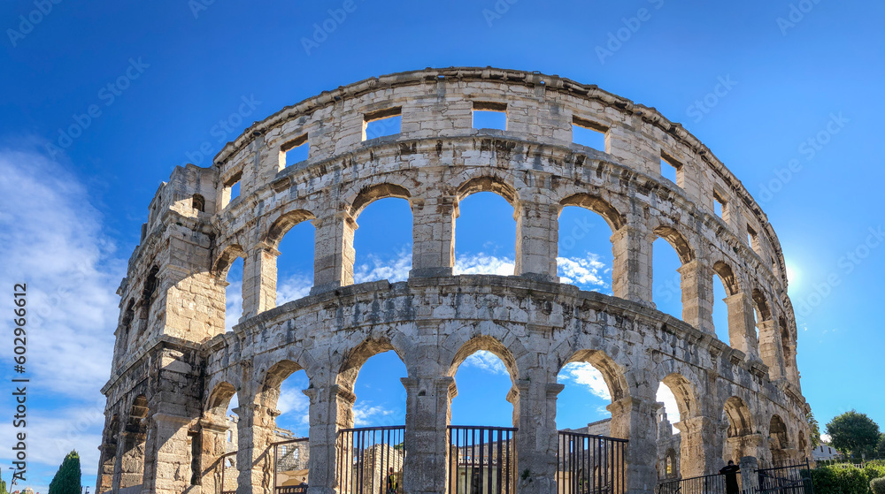 Panorama View of Pula Arena with Arch Window. Beautiful Roman Amphitheater in Croatia. Historic Landmark in Europe.