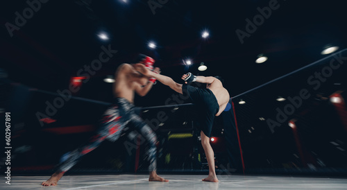 MMA Boxers fighters in fights without rules in ring octagon, motion blur, dark background banner