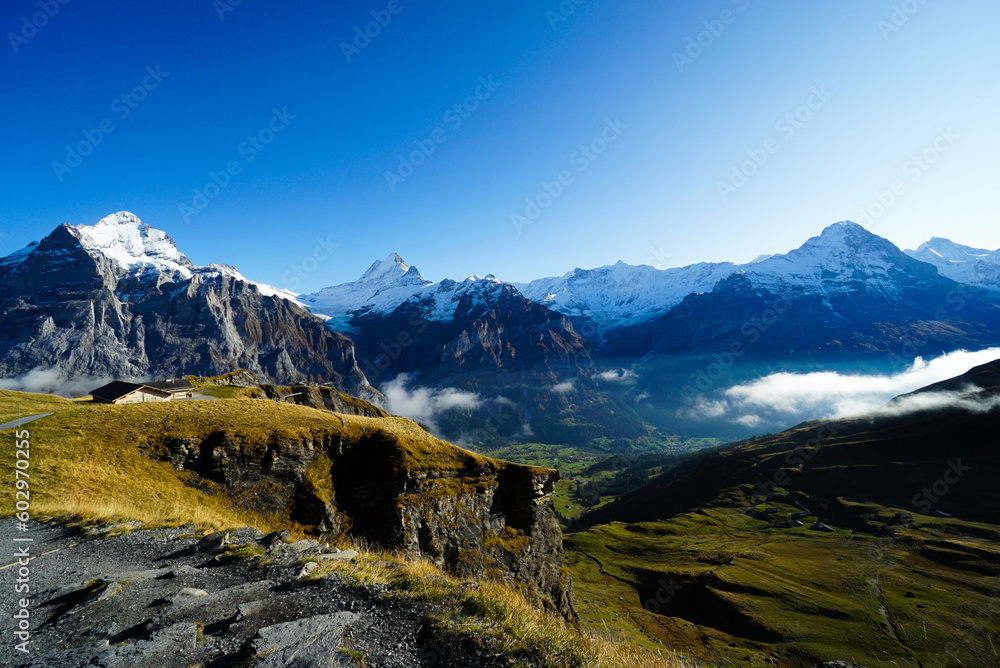 Beautiful foggy view in the morning, Grindelwald First, Highest peaks Eiger, Switzerland Alps.