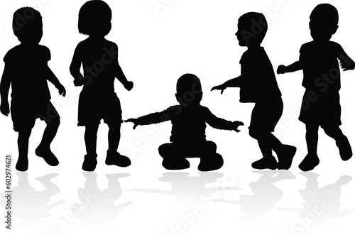 Group of dancing children, black silhouettes.	
