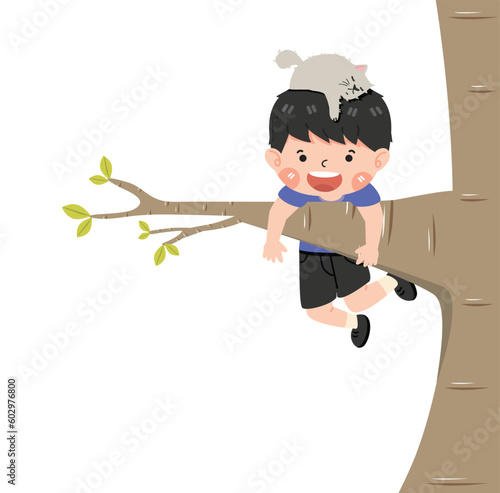 Boy hanging on a tree branch © focus_bell
