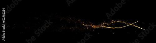 Beautiful golden particles flying shine glitter awards dust abstract on black background. Magical shimmering light.