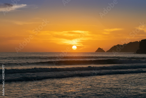 Patong Beach Phuket Thailand nice white sandy beach clear blue and turquoise waters and lovely blue skies with Palms tree sunset sunrise