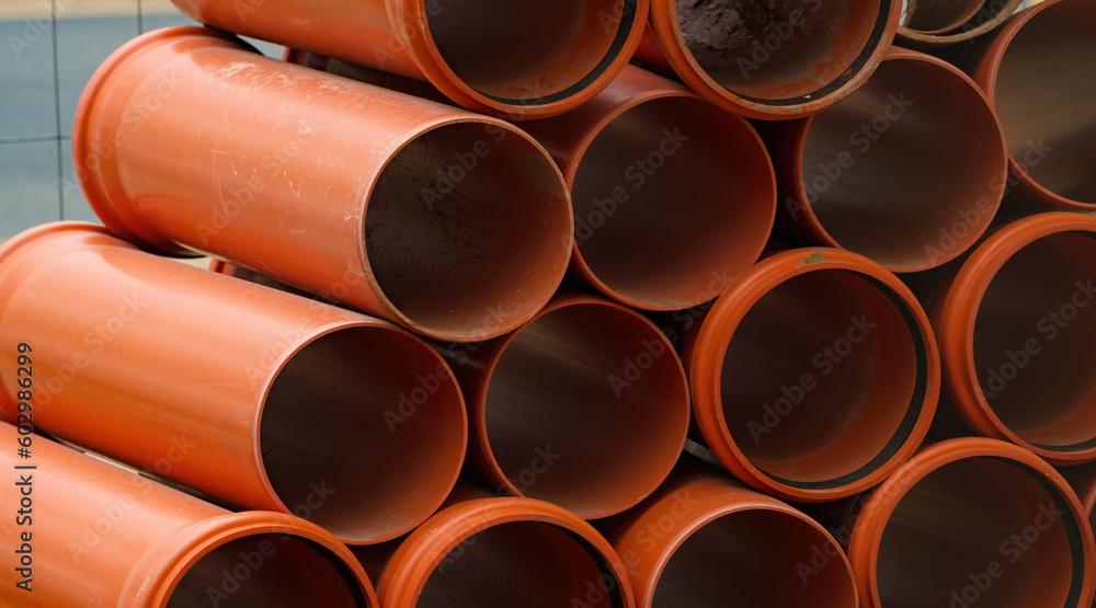 Stacked hdpe sewage pipes on construction site Stacked hdpe sewage pipes on construction site