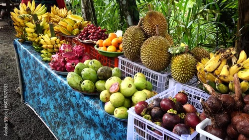 Bali, Indonesia Exotic Balinese fruit like spike fruit for sale at a market stand.  photo