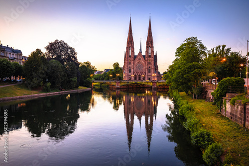 Saint Paul church in Strasbourg canal reflection sunset view