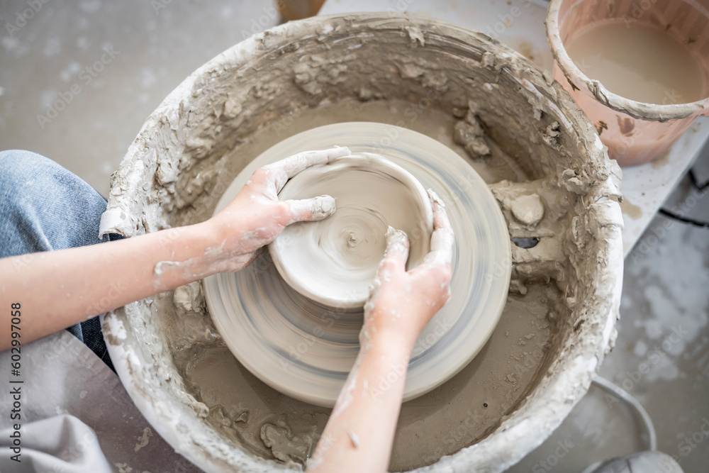 Fototapeta premium Children learn ceramic casting technology