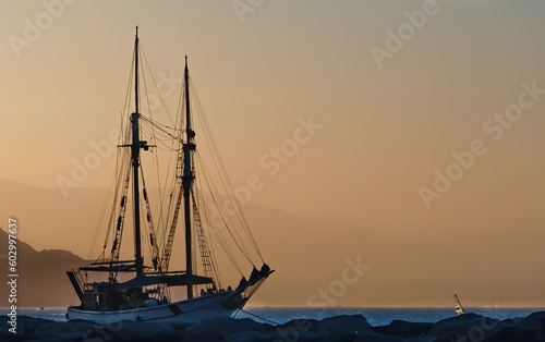 Sailing boat at sunset, Red Sea, Sinai, dust storm