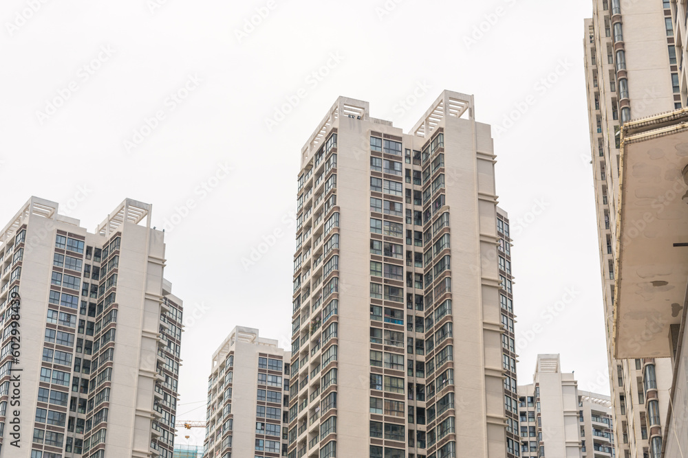 Beihai, China - July 18, 2019: Modern Chinese Apartment Building With Balconies in Residential Area
