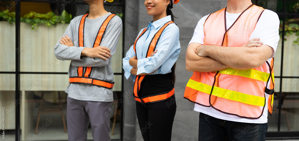 Arms crossed. Professional team working at workplace. Unity and teamwork concept. Portrait engineer factory manager worker and mechanic team together in factory workplace Arms crossed. Professional team working at workplace. Unity and teamwork concept. Portrait engineer factory manager worker and mechanic team together in factory workplace
