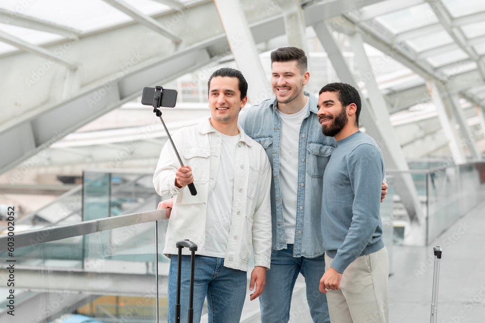 Globetrotters Friends Men Making Selfie Via Smartphone In Modern Airport