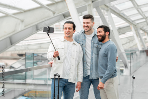 Globetrotters Friends Men Making Selfie Via Smartphone In Modern Airport