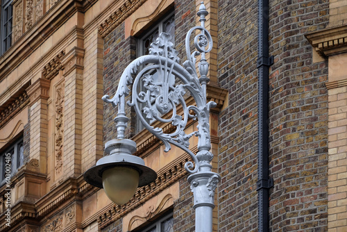 Orrnate iron street lamp with shamrock design found in older neighborhoods of Dublin photo