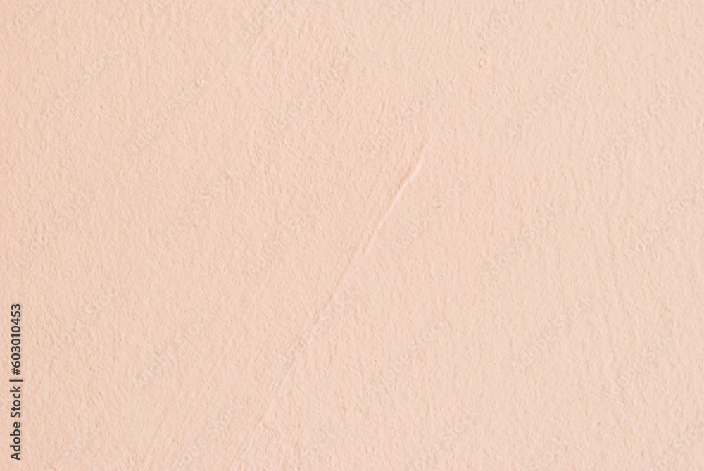 Fototapeta premium Light pink plastered wall background, plastered texture