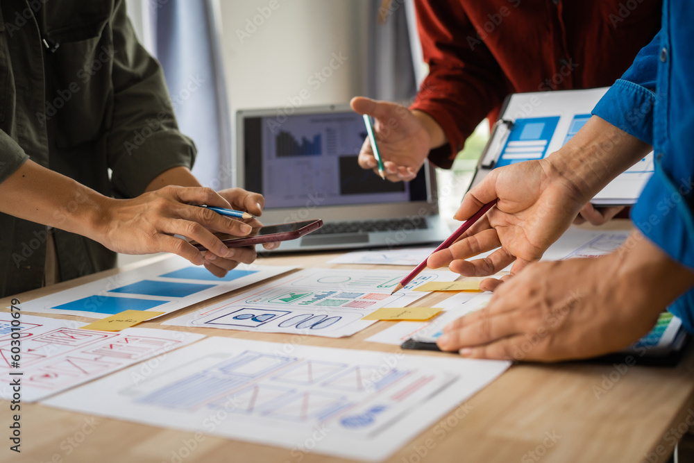 Group of asian creative team programing designers participate in all phases of the UX design. Group of asian creative team programing designers participate in all phases of the UX design.