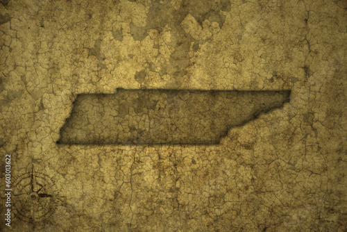 map of tennessee state on a old vintage crack paper background . photo