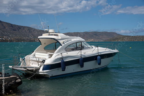 Elounda, Crete, Greece, EU. 2023. Motor yacht on the Mirabella Gulf at Elounda, Crete