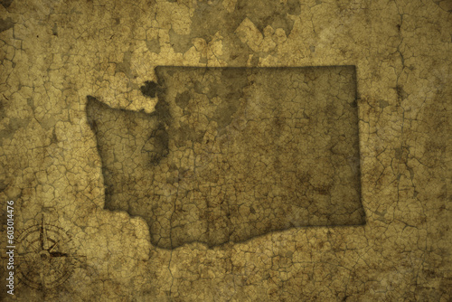 map of washington state on a old vintage crack paper background .