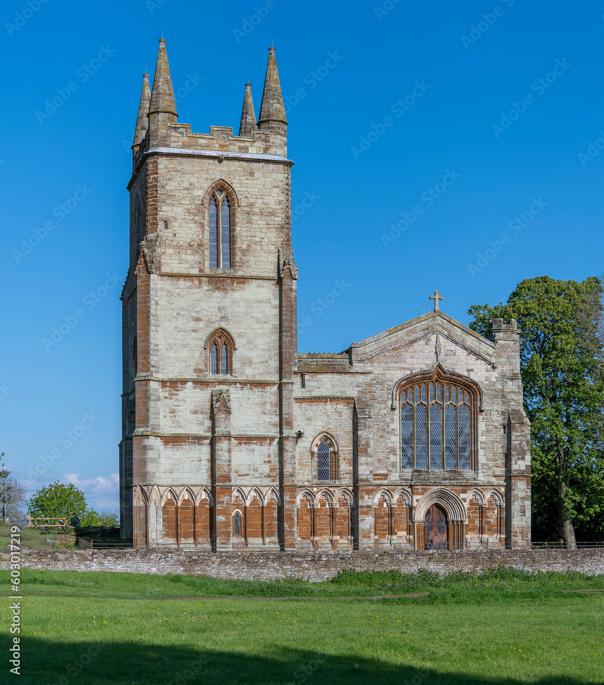 A panorama  view of the church of Canons Ashby Priory, UK in summertime
