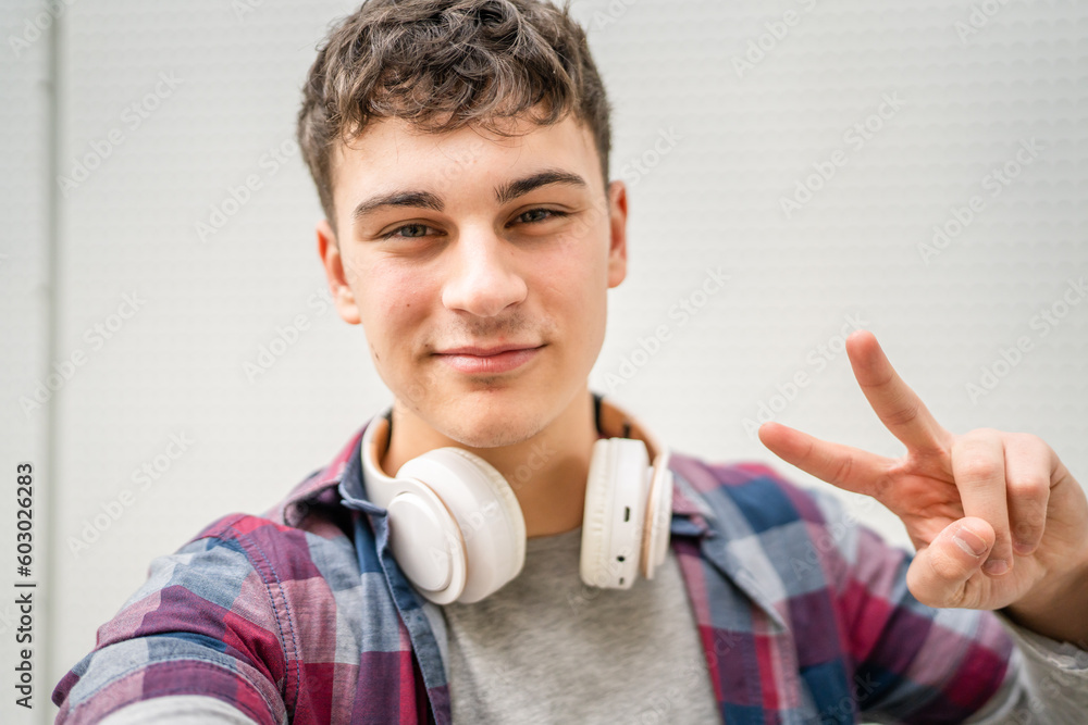 portrait of young Caucasian man teenager 18 or 19 years old outdoor