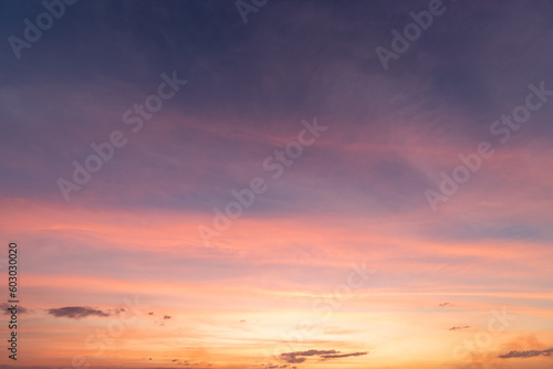  Panoramic view of sunset golden and blue sky nature background. Colorful dramatic sky with cloud at sunset.Sky background.Sky with clouds at sunset.