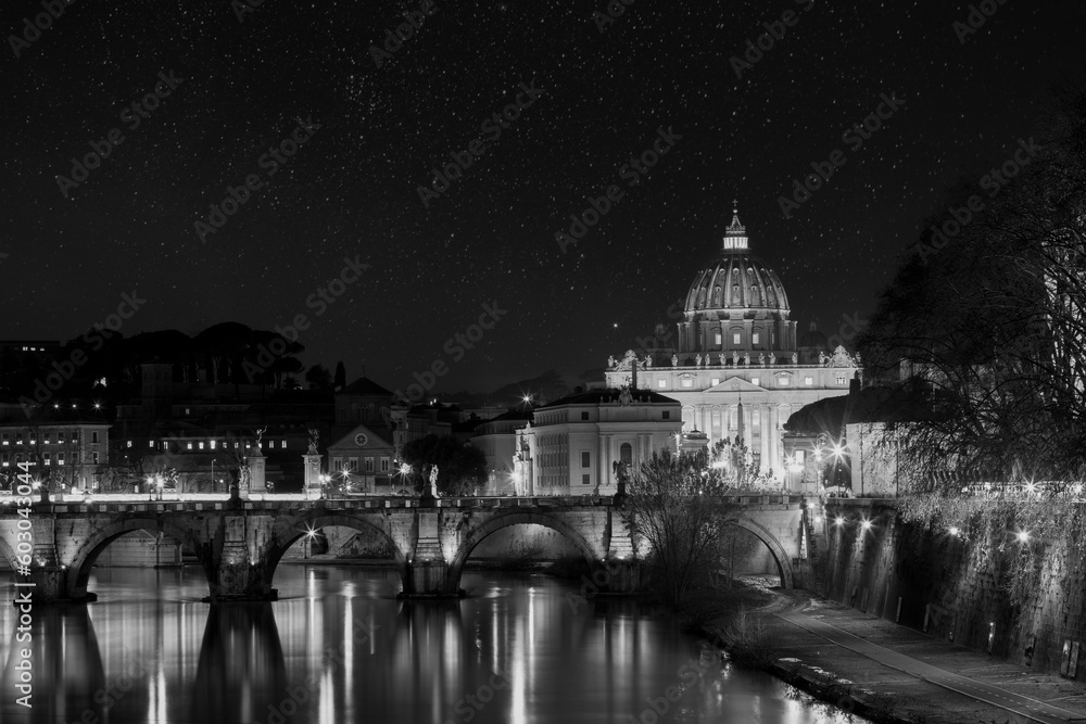 Black and white Romantic Saint Peter's Basilica in Vatican City and Ponte Vittorio Emanuele II bridge at night with moon. Rome Italy Europe